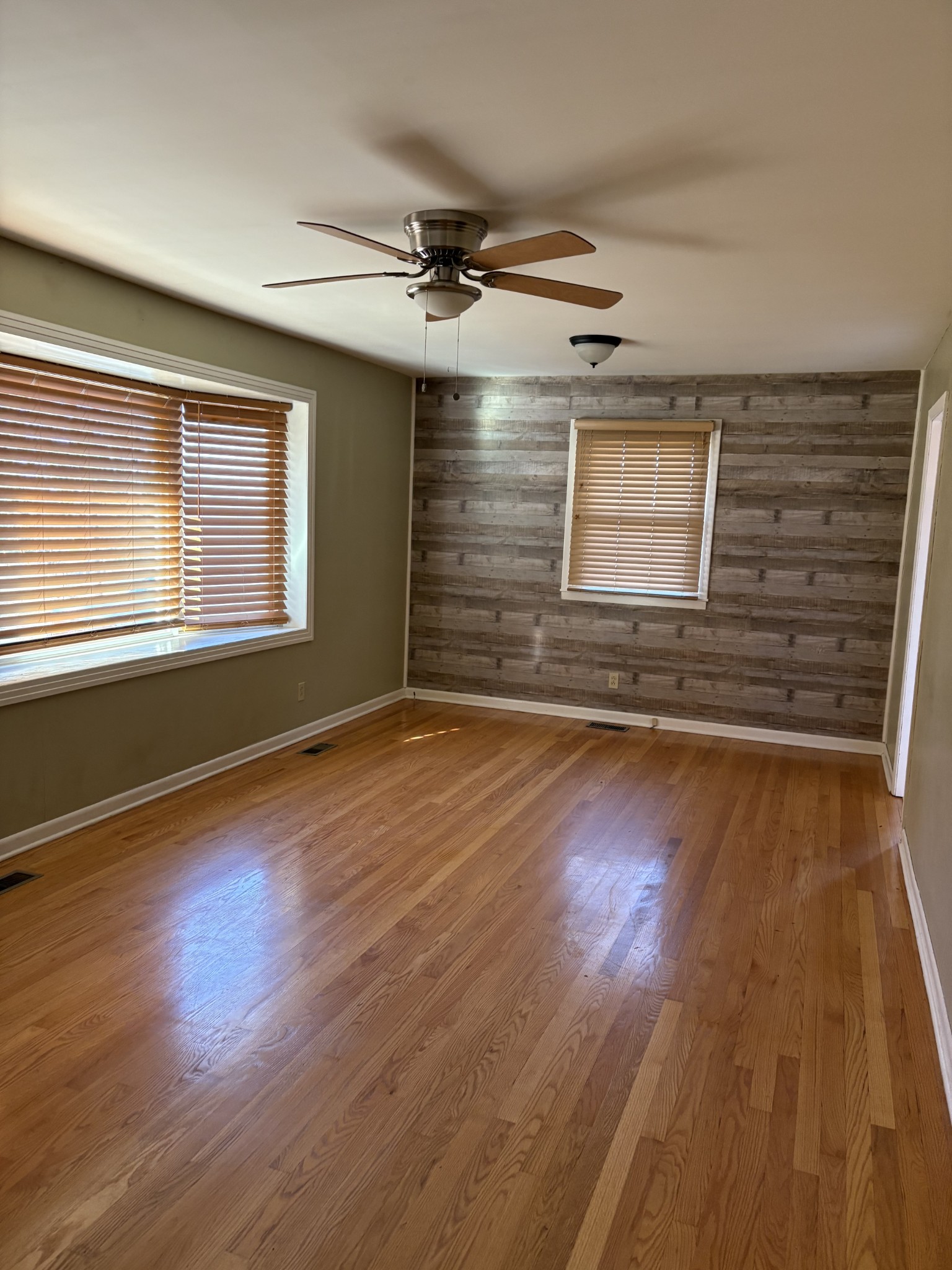 3179 Holly Grove Road Lascassas, TN 37085 - Photo 7 of 15 a view of an empty room wooden floor and a window