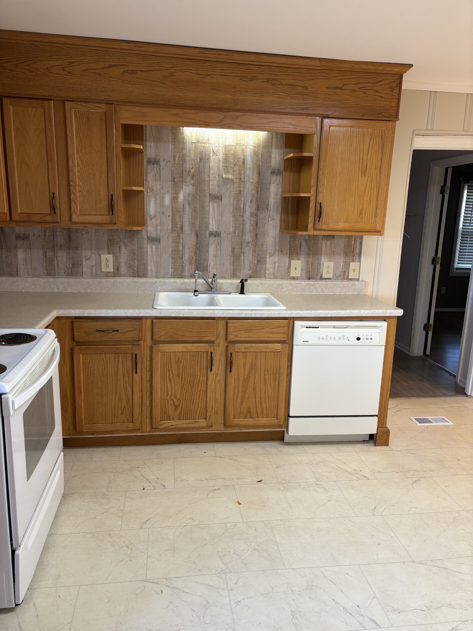 3179 Holly Grove Road Lascassas, TN 37085 - Photo 8 of 15 a kitchen with stainless steel appliances granite countertop a sink stove and cabinets