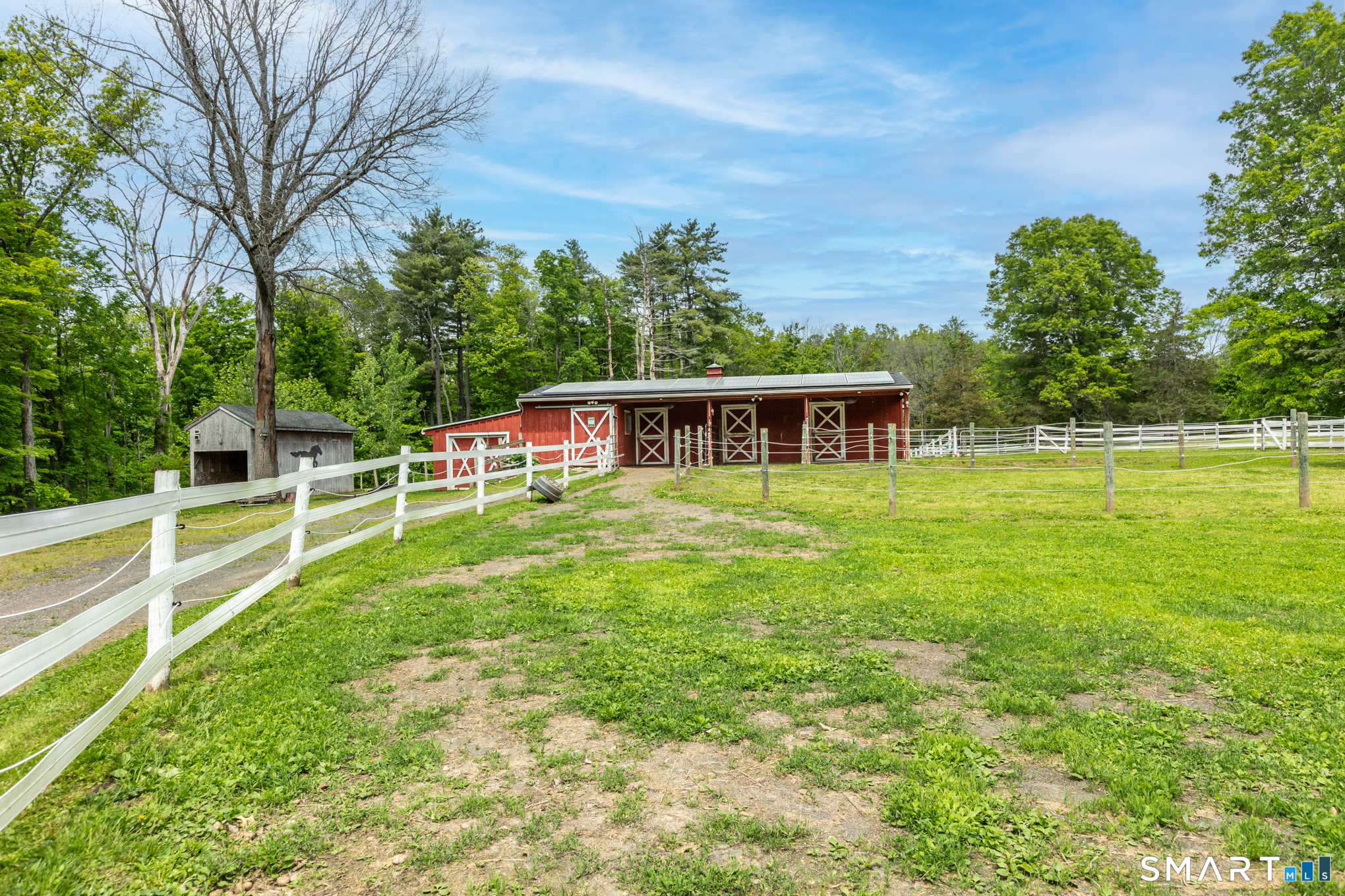 808 Branch Road Suffield, CT 06078 - Photo 32 of 40 a view of a house with a backyard