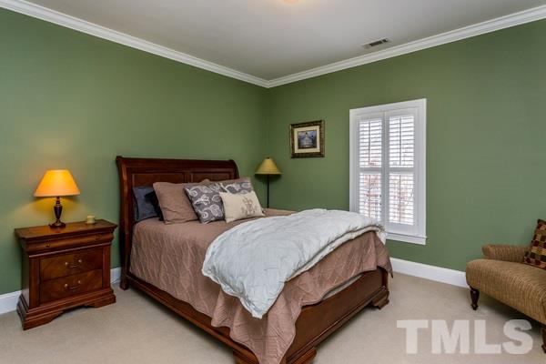 1139 Harp Street Raleigh, NC 27604 - Photo 17 of 25 a bedroom with a bed and a window