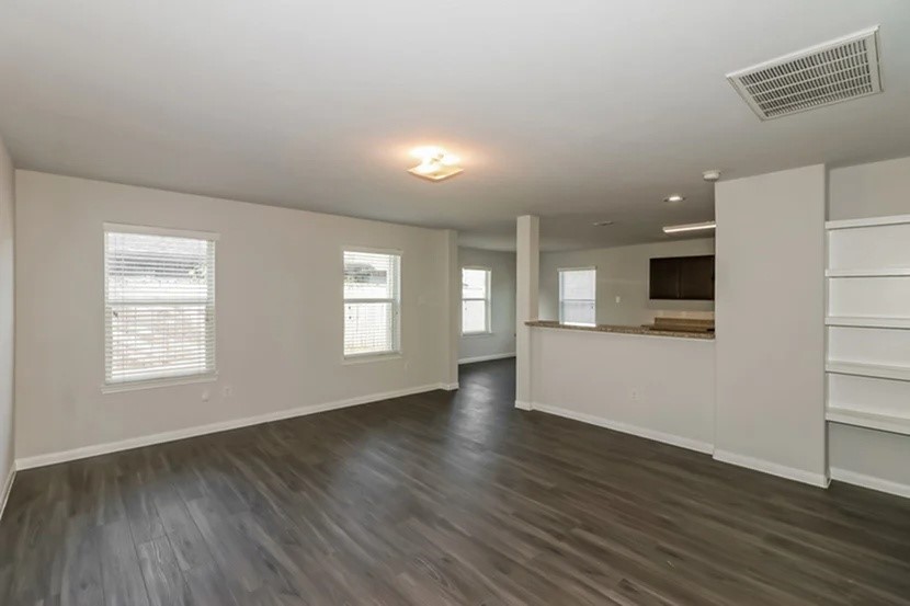 12623 Wild Strawberry Road Houston, TX 77038 - Photo 5 of 13 Photos may be representative of the floor plan and not the exact home. Finishes, layout, and features of the actual property for lease may vary.