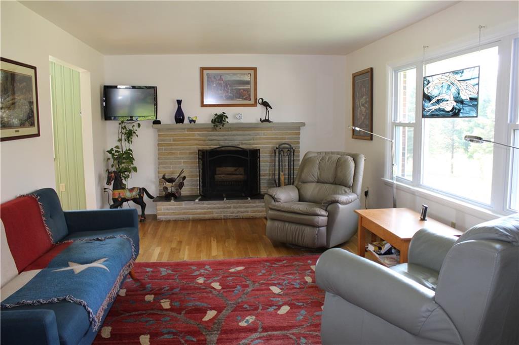 1096 Shenango Road Beaver Falls, PA 15010 - Photo 7 of 25 Living Room Has Great Wood Burning Fireplace. (Gas Lines are Located below In Basement if Someone wants a Gas Fireplace Instead it could be added)