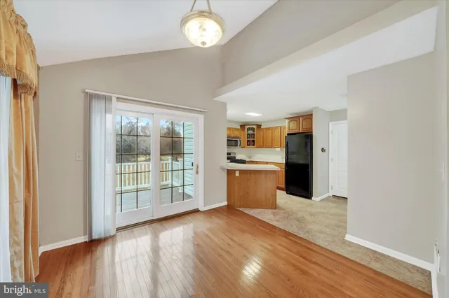 a view of kitchen with wooden floor