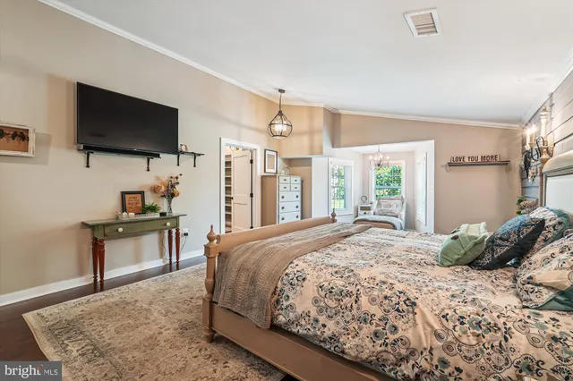 a view of entryway with stairs and wooden floor