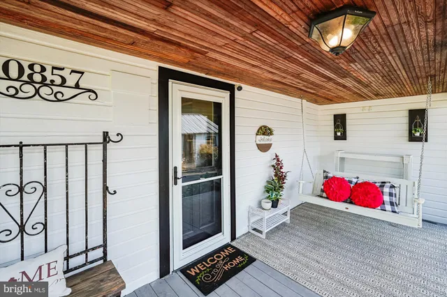 an outdoor space with patio furniture and umbrella