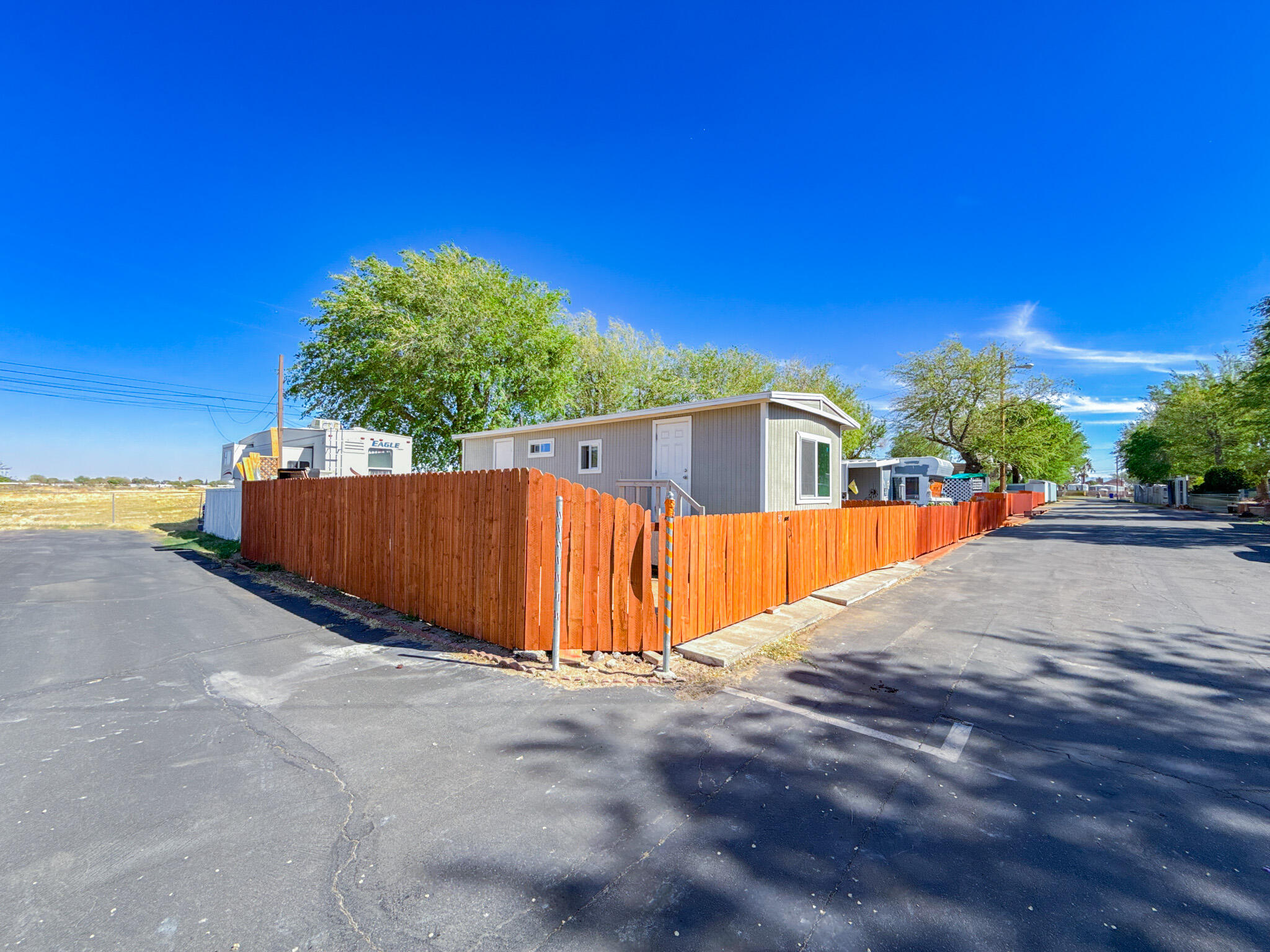 45446 7th Street East Lancaster, CA 93535 - Photo 3 of 16 a view of a house with a street