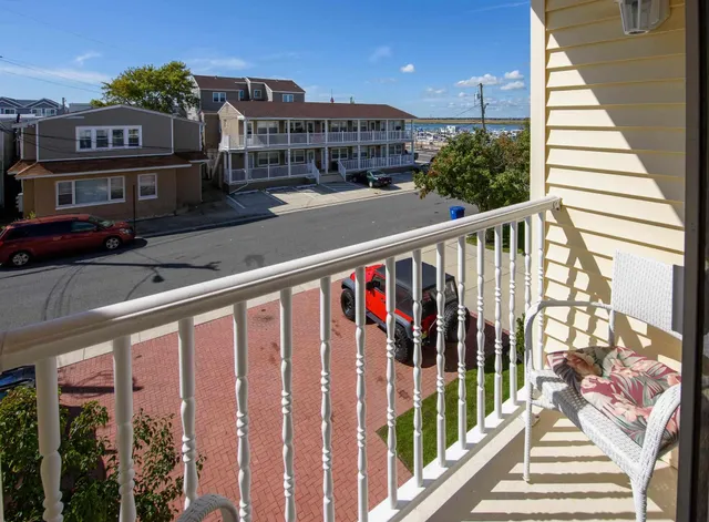 a view of a balcony with city view