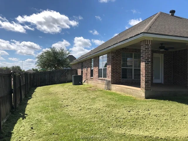 a house view with a garden space