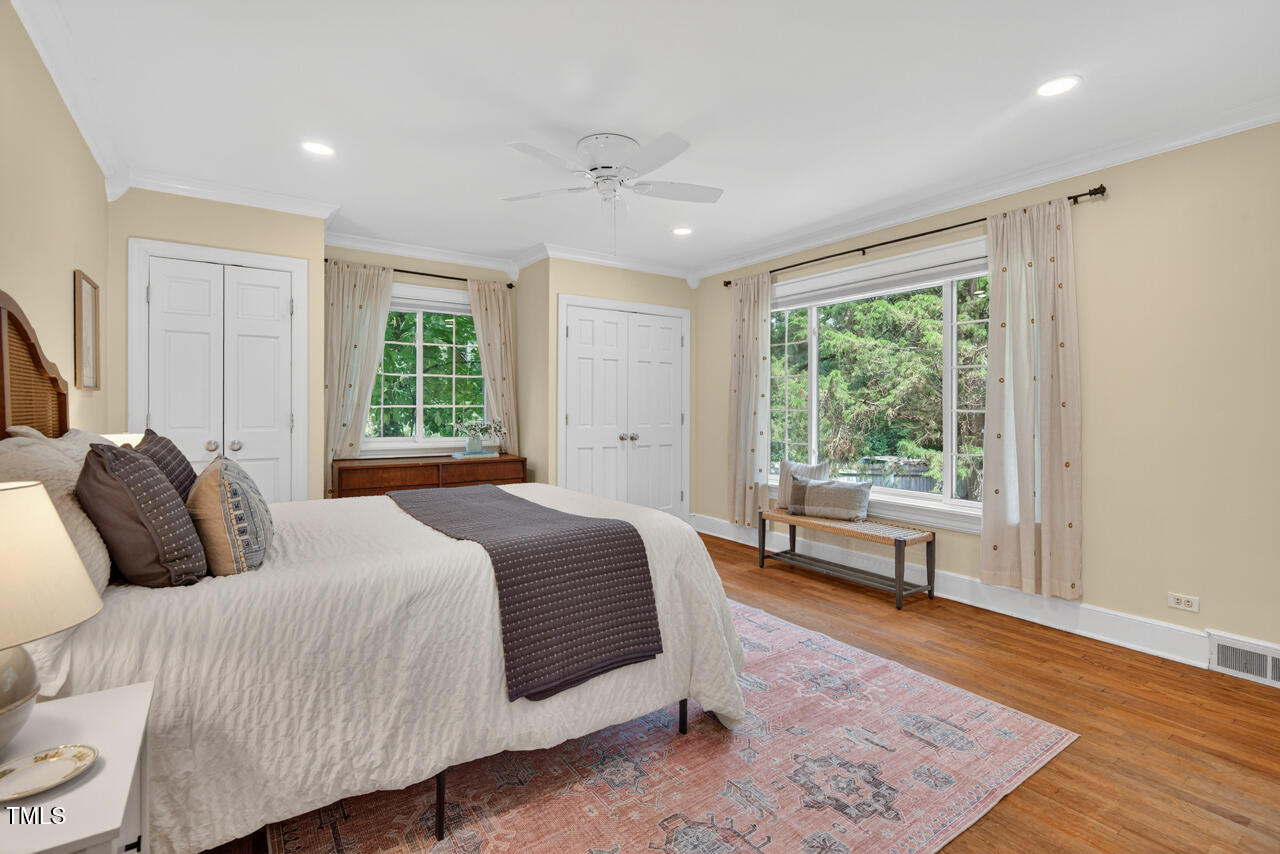 3535 Hope Valley Road Durham, NC 27707 - Photo 10 of 24 a bedroom with a large bed and a window