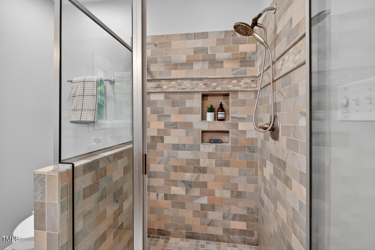 3535 Hope Valley Road Durham, NC 27707 - Photo 14 of 24 a bathroom with a shower