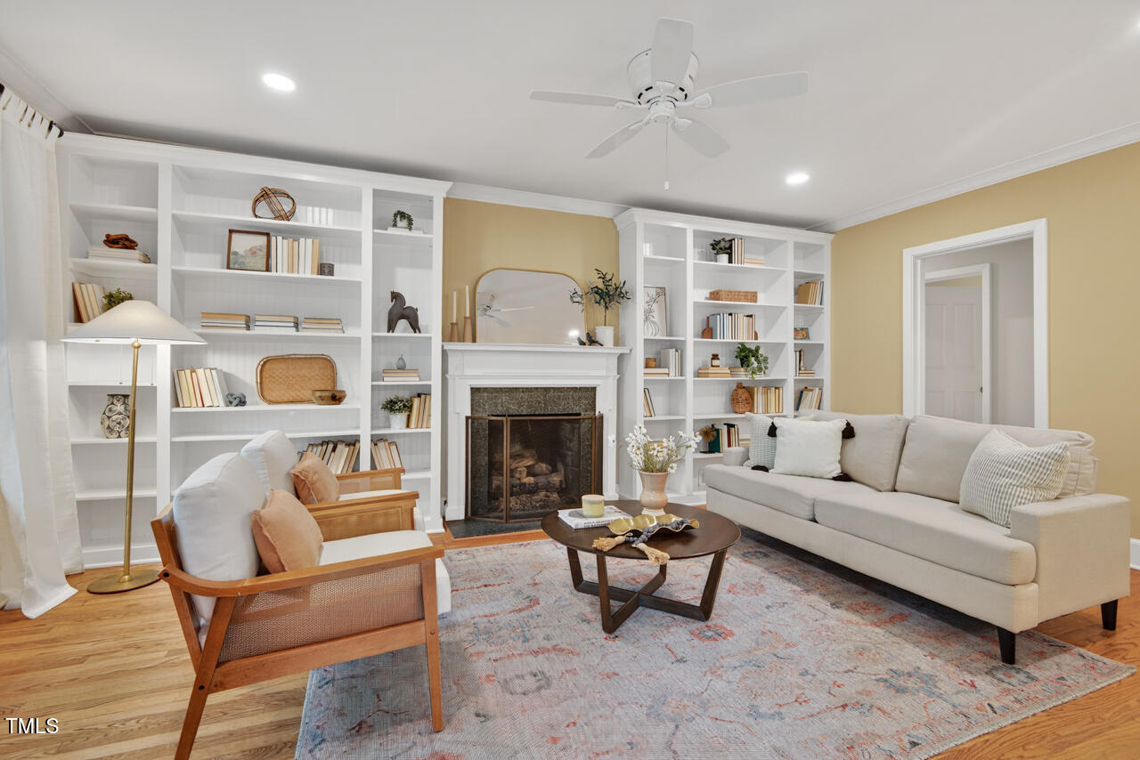 3535 Hope Valley Road Durham, NC 27707 - Photo 2 of 24 a living room with furniture and a fireplace