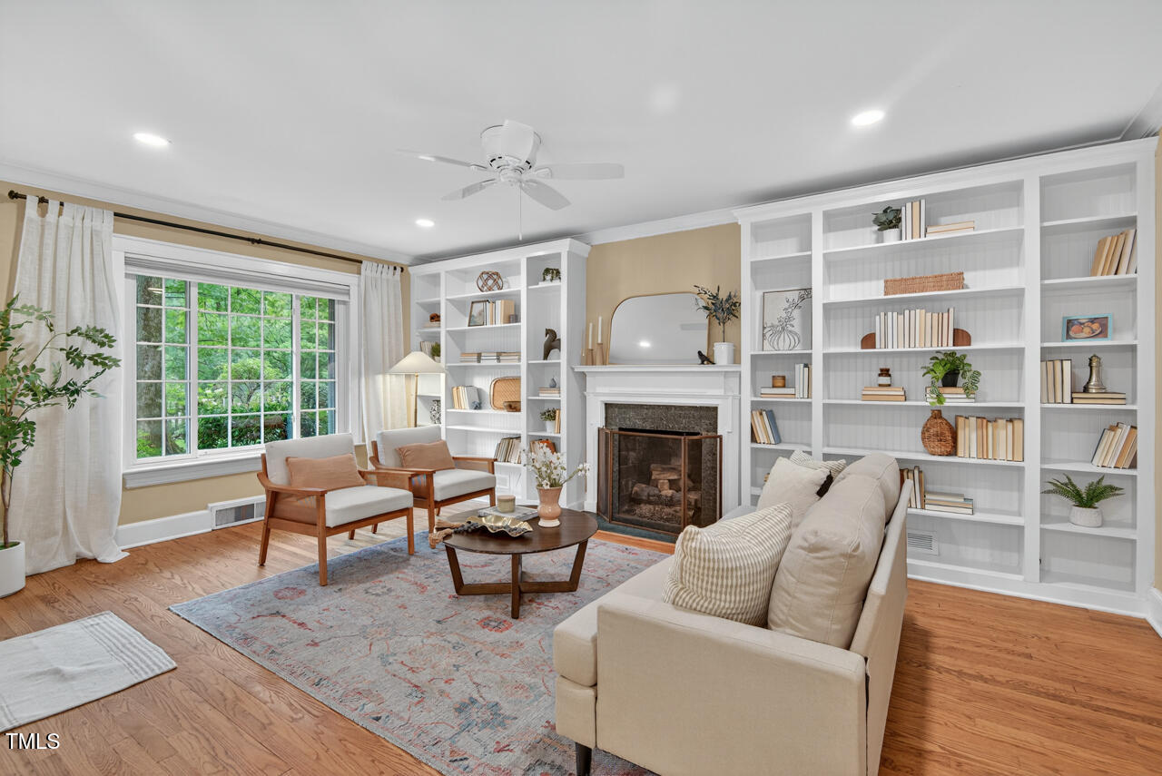 3535 Hope Valley Road Durham, NC 27707 - Photo 3 of 24 a living room with furniture and a fireplace