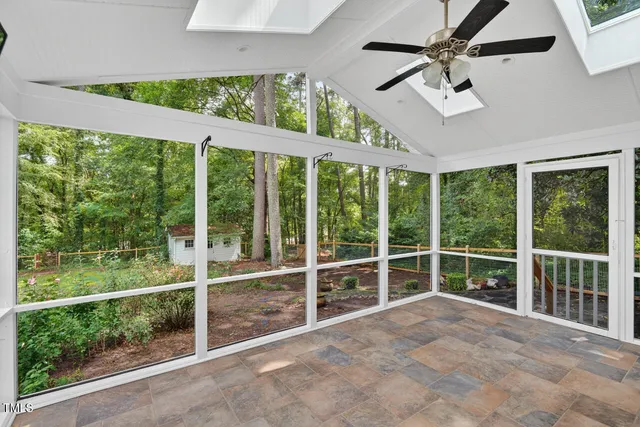a view of a room with a large window