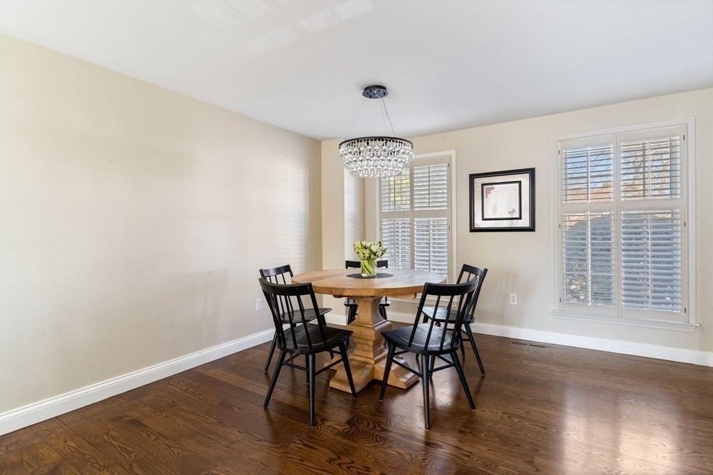 88 Standish Road Needham, MA 02492 - Photo 12 of 26 a view of a dining room with furniture window and wooden floor