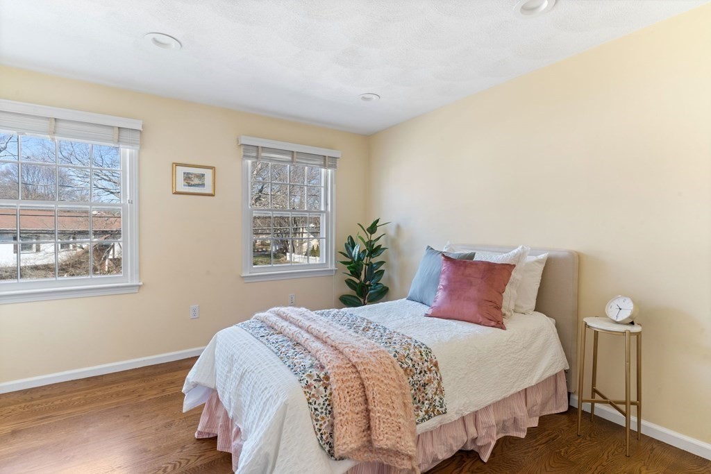 88 Standish Road Needham, MA 02492 - Photo 20 of 26 a bedroom with a large bed and a window