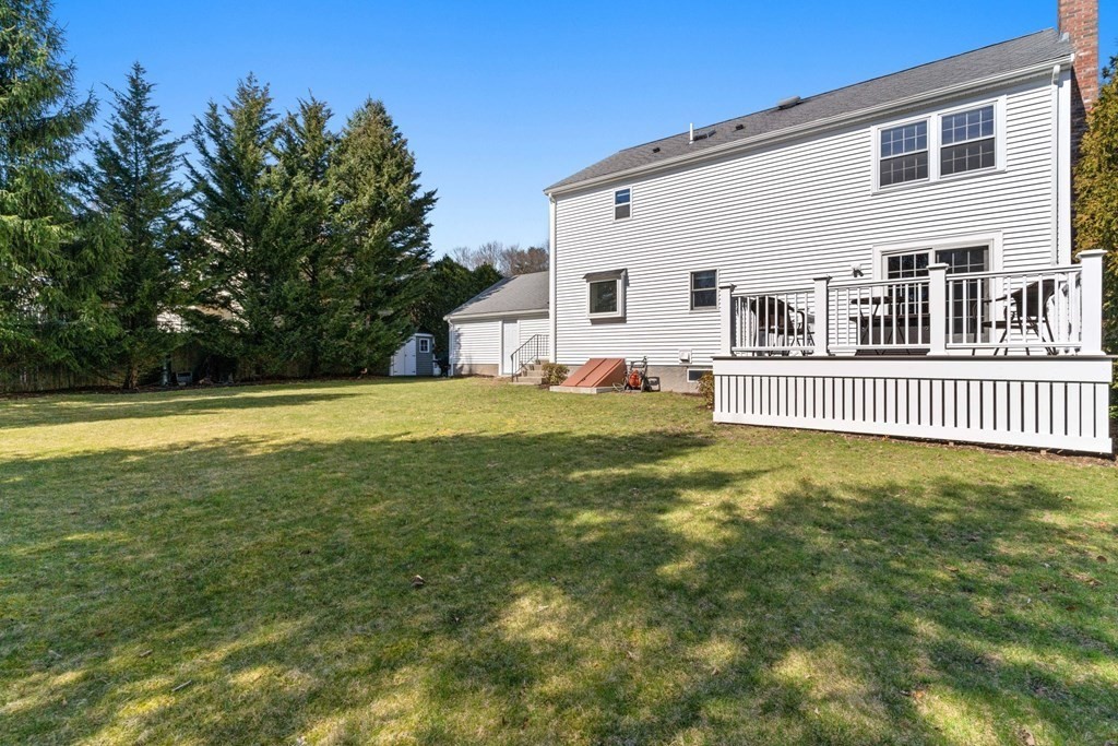 88 Standish Road Needham, MA 02492 - Photo 24 of 26 a view of a house with a yard and deck