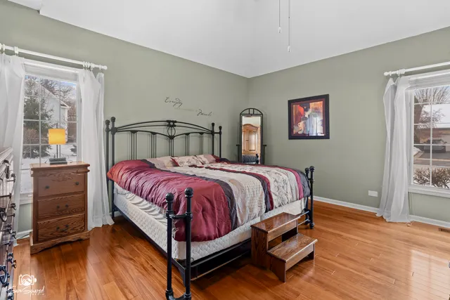 a spacious bathroom with a sink double vanity and a mirror