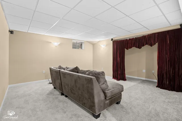 a living room with furniture and a couch