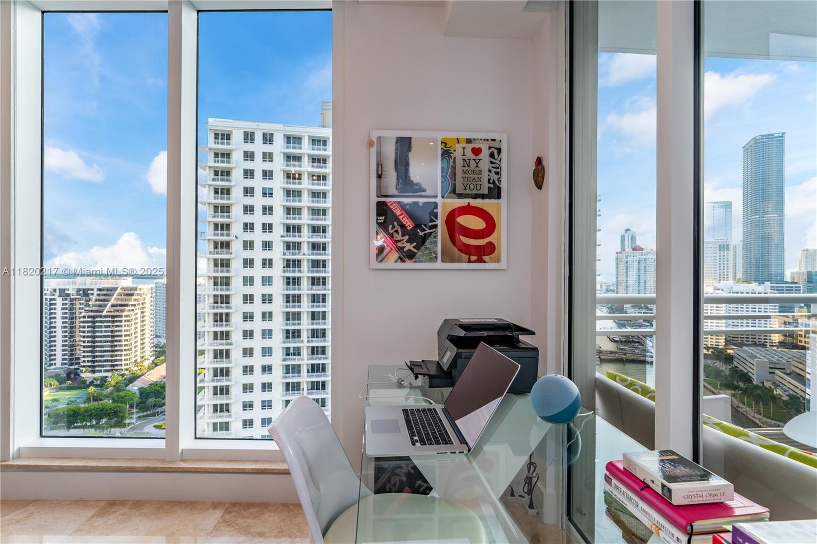 901 Brickell Key Boulevard, Unit 2602 Miami, FL 33131 - Photo 29 of 29 a living room with furniture and a window