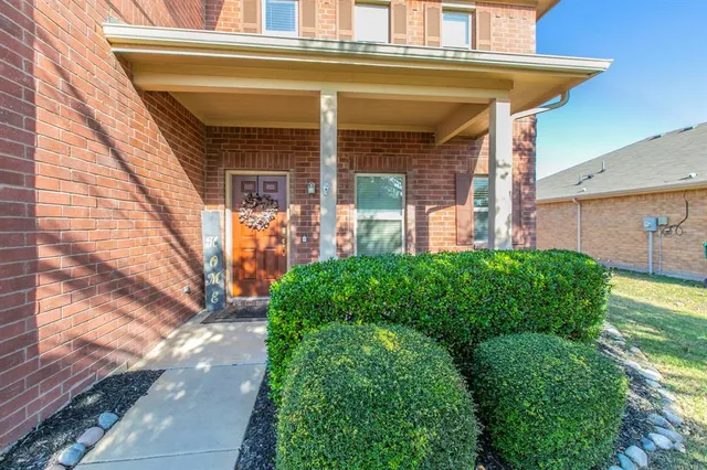 a view of a bird house next to road