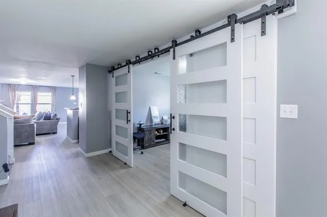 a view of livingroom with furniture and wooden floor