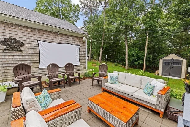 a backyard of a house with seating space