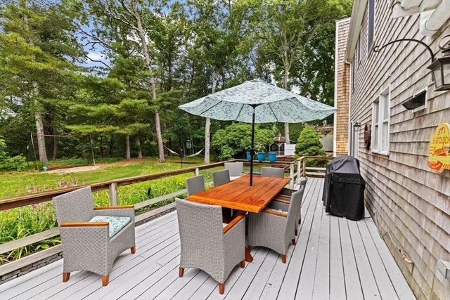 a view of swimming pool with seating area and furniture
