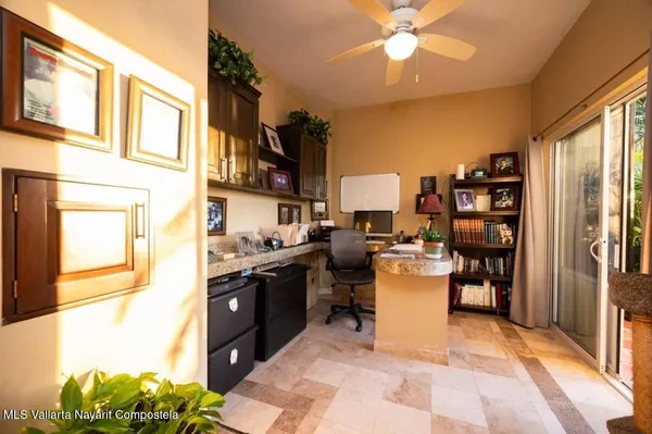 a kitchen with a sink cabinets and appliances
