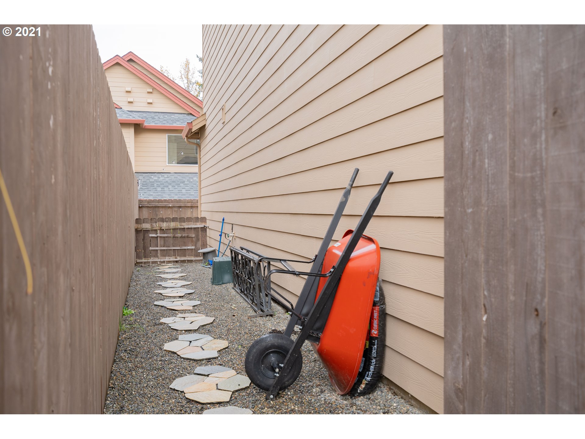 1248 South Quail Run Place Ridgefield, WA 98642 - Photo 28 of 28 a backyard of a house with seating space