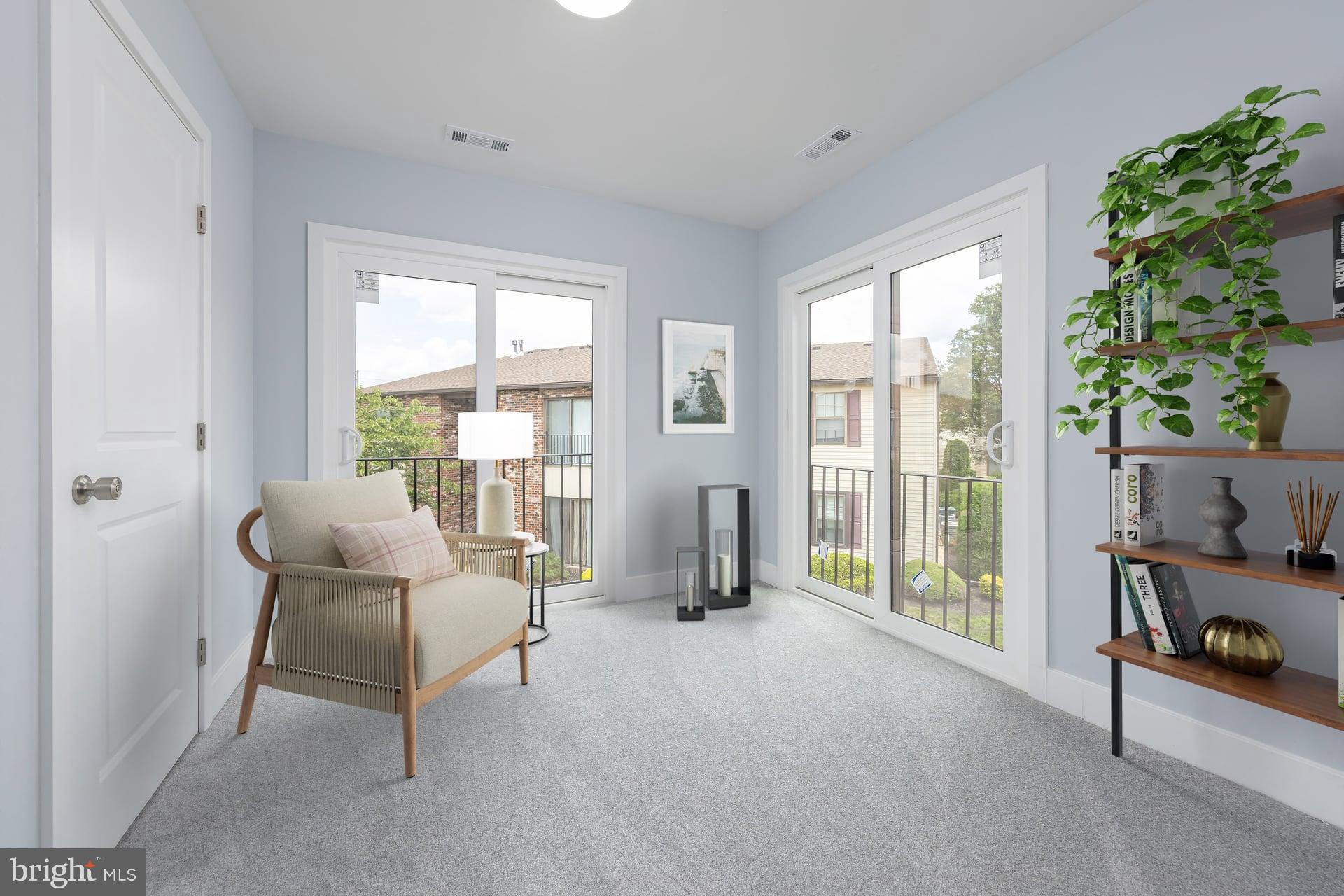 18 Brighton Place Sewell, NJ 08080 - Photo 3 of 19 a living room with furniture and a floor to ceiling window