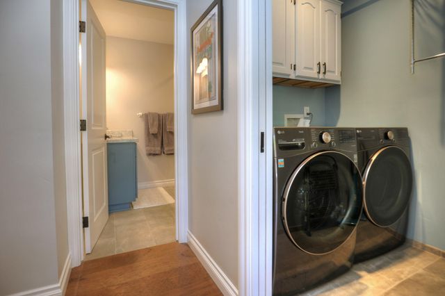 a view of a storage & utility room with washer and dryer