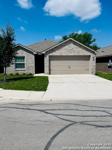 a small white house with a outdoor space