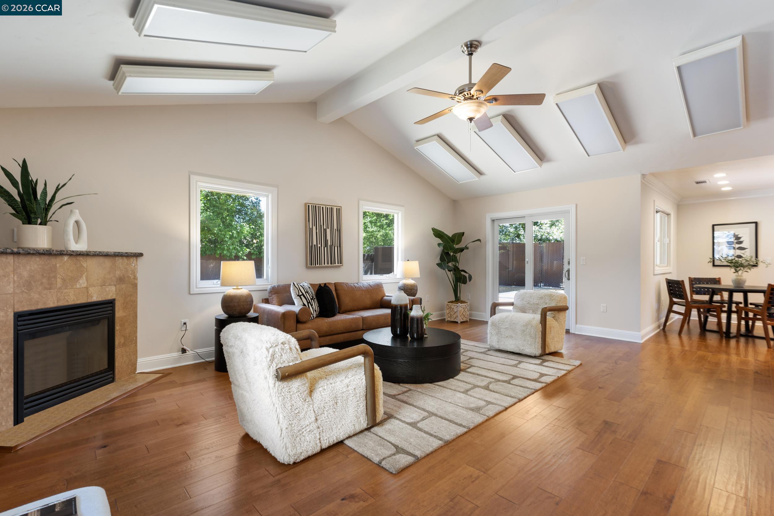 484 Diablo Road Danville, CA 94526 - Photo 21 of 39 a living room with furniture and a fireplace