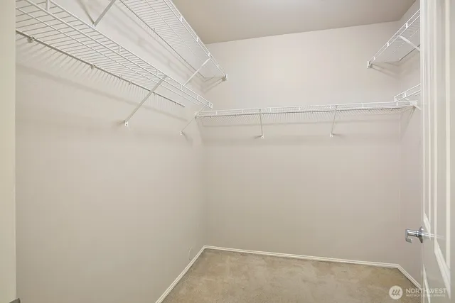 a view of a room with racks on the wall