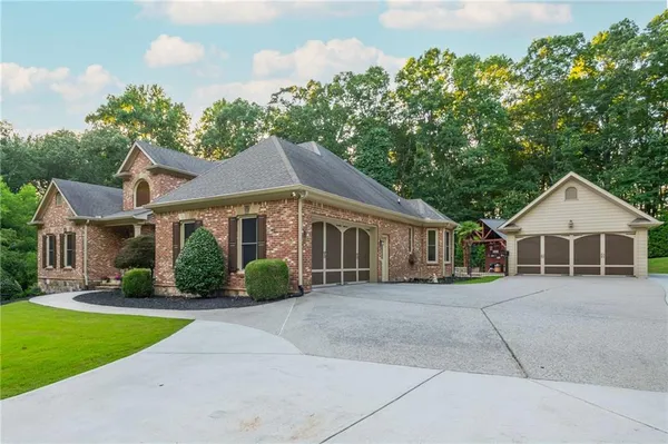front view of a house with a yard