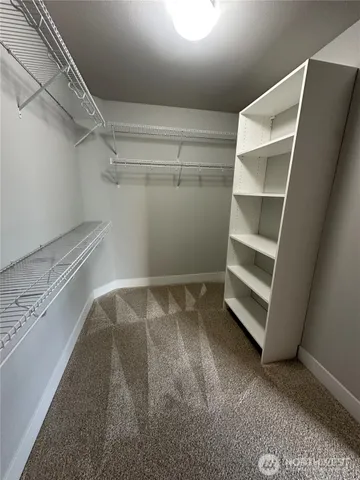 a view of an empty walk in closet