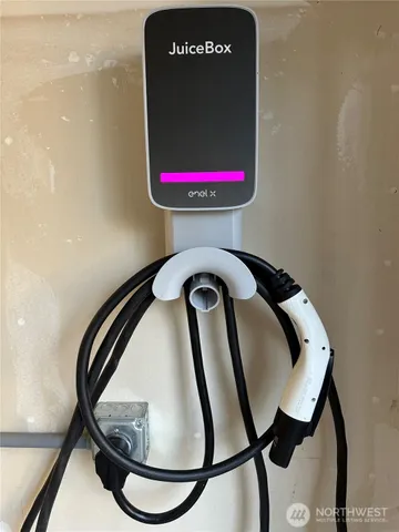 a bathroom with a toilet and a mirror