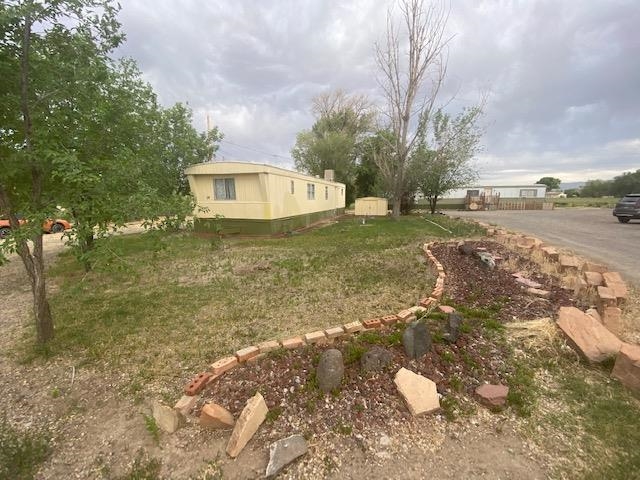 3349 F Road, Unit 14 Clifton, CO 81520 - Photo 1 of 10 a view of a house with a yard