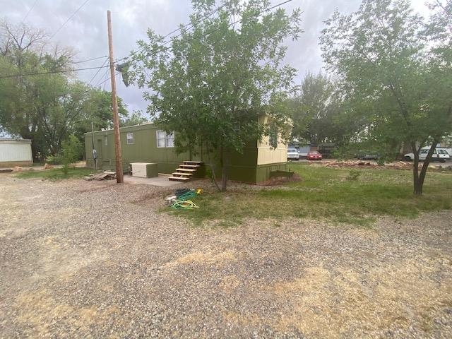 3349 F Road, Unit 14 Clifton, CO 81520 - Photo 3 of 10 a backyard of a house with lots of green space