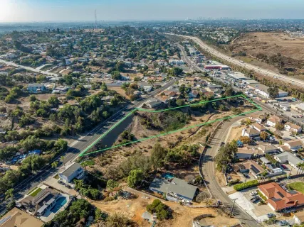 a view of city with ocean