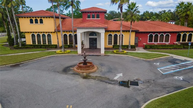 a front view of a house with garden and porch