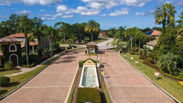 a view of swimming pool with sitting area