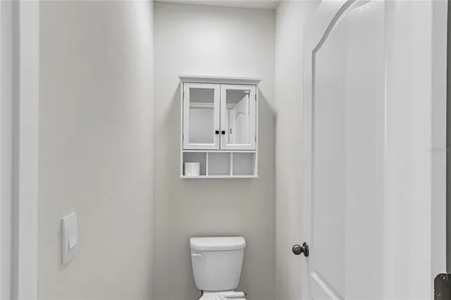 a bathroom with a toilet