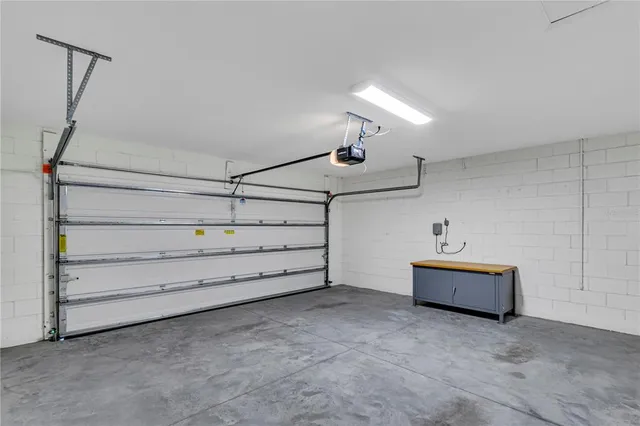 a view of room with furniture and a chandelier