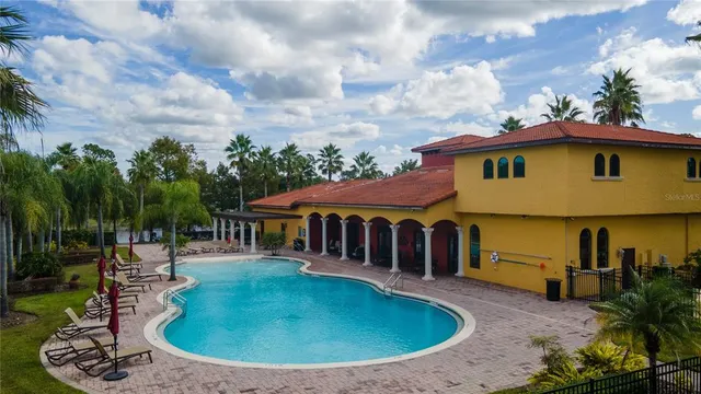 a view of a house with a swimming pool