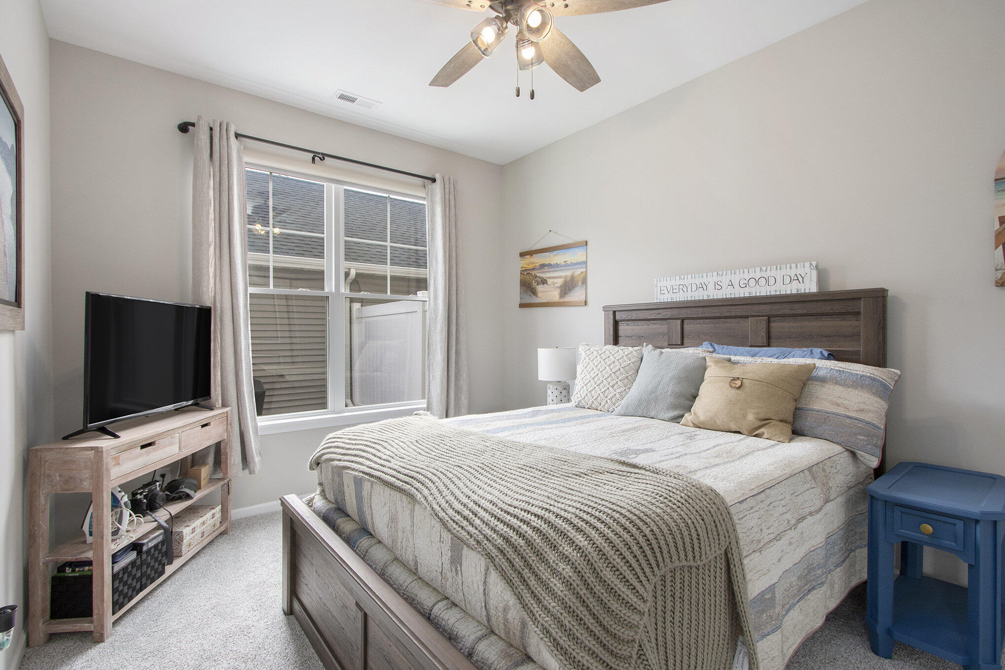 1053 East 117th Lane Crown Point, IN 46307 - Photo 11 of 23 a bedroom with a bed and a flat screen tv