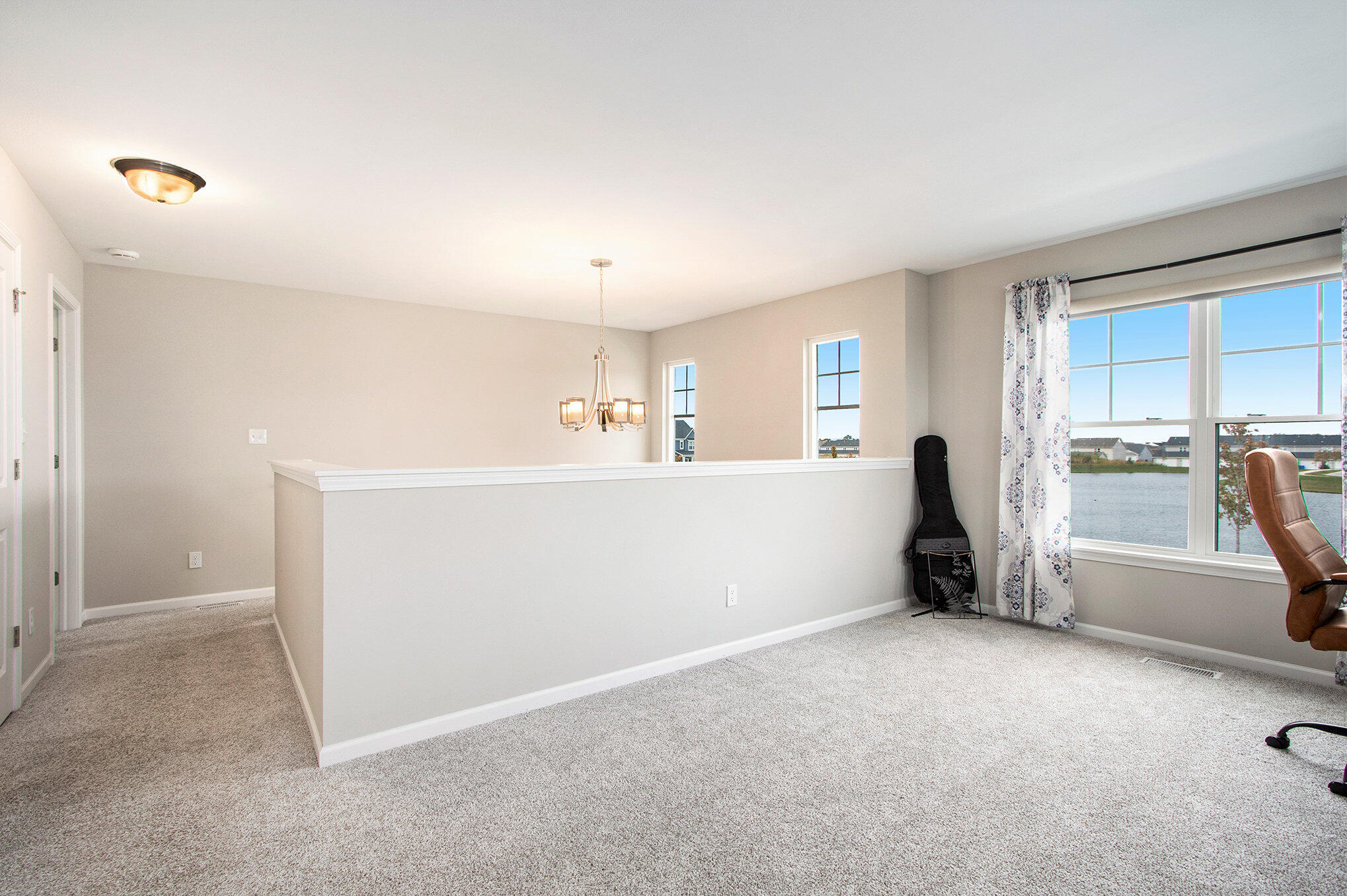 1053 East 117th Lane Crown Point, IN 46307 - Photo 14 of 23 a view of an empty room with a window