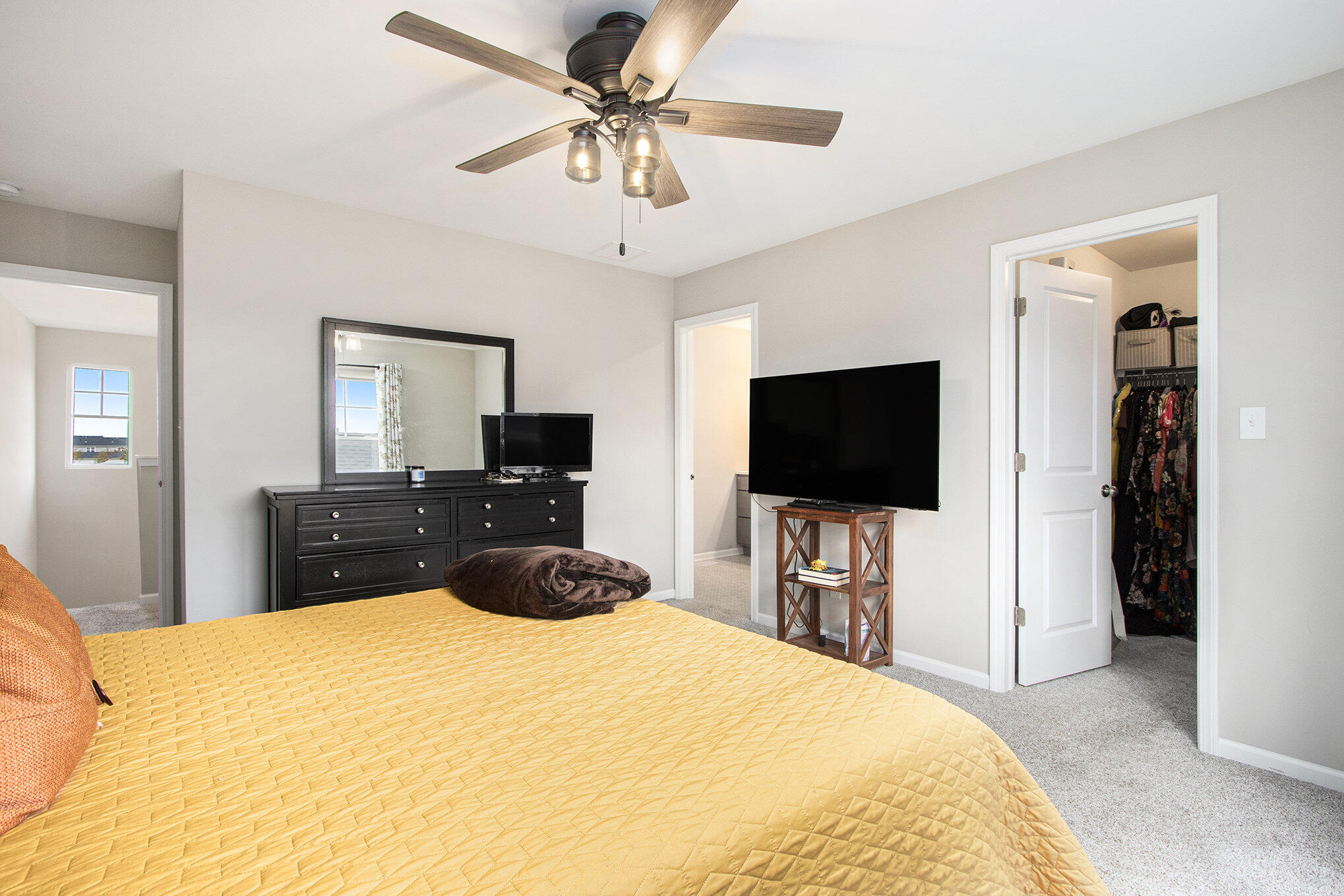 1053 East 117th Lane Crown Point, IN 46307 - Photo 16 of 23 a bedroom with a bed and a flat screen tv