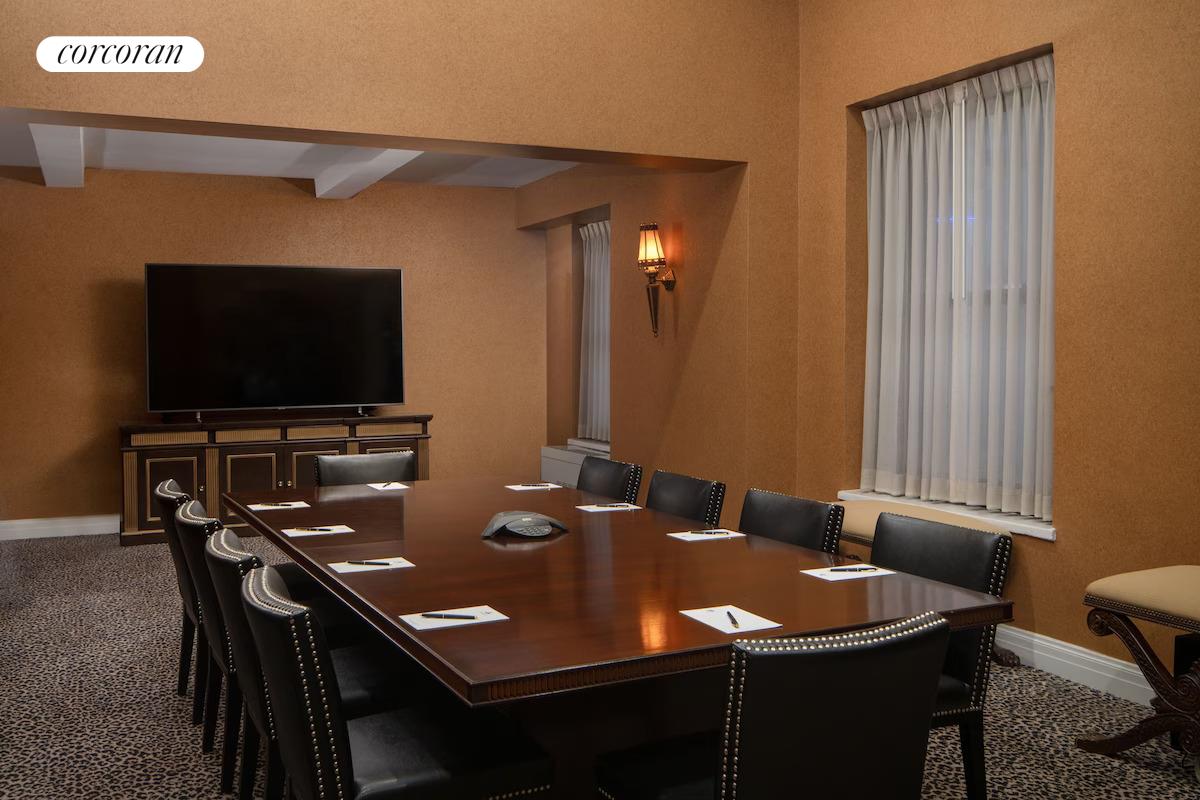 200 West 56th Street, Unit 904 Manhattan, NY 10019 - Photo 15 of 15 a view of a livingroom with furniture