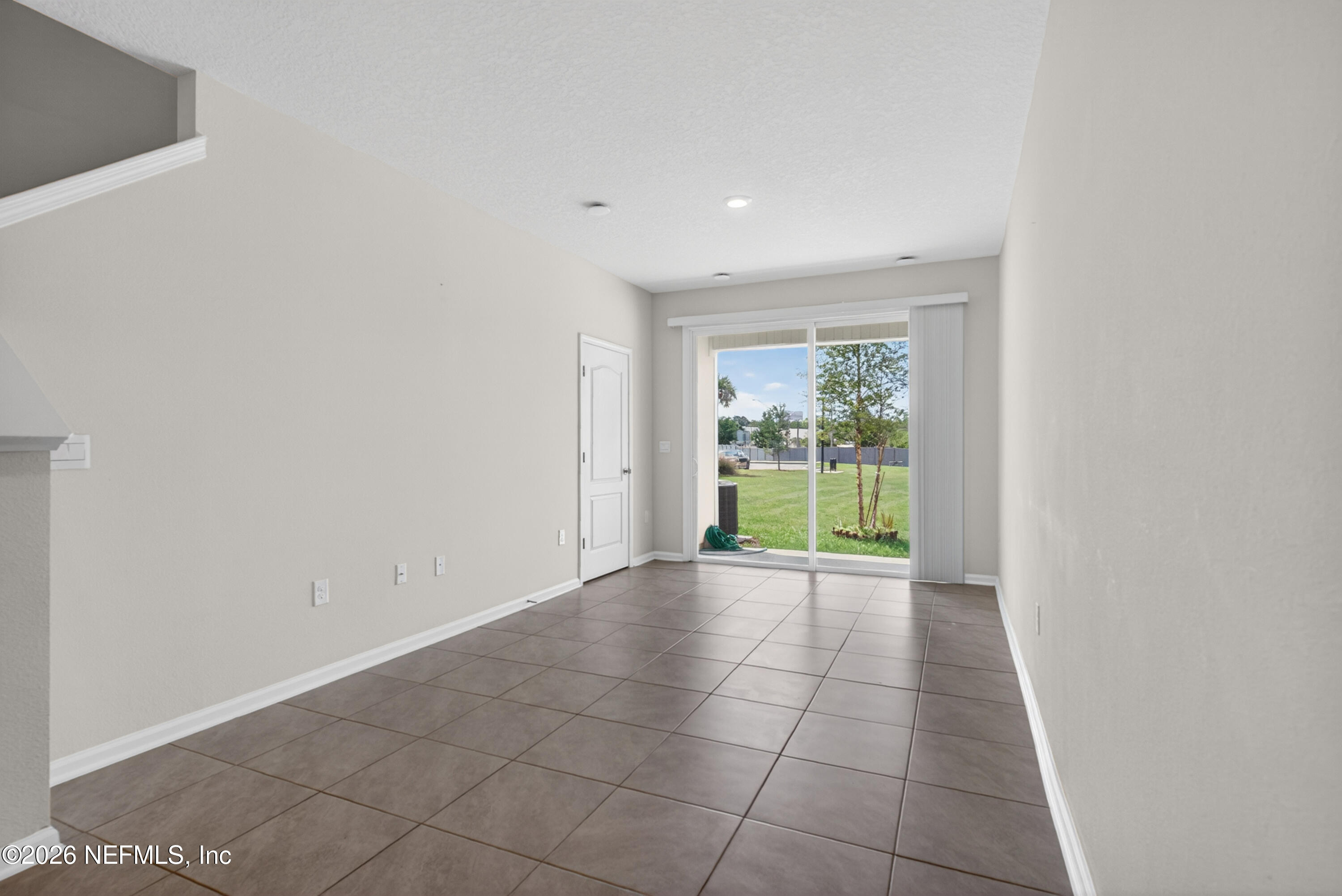 8210 Larose Road Jacksonville, FL 32211 - Photo 10 of 38 a view of an empty room with a window